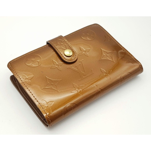 709 - A Louis Vuitton Patent Bronze Leather Purse. Monogram decoration. Brown leather interior. 13cm x 9cm... 