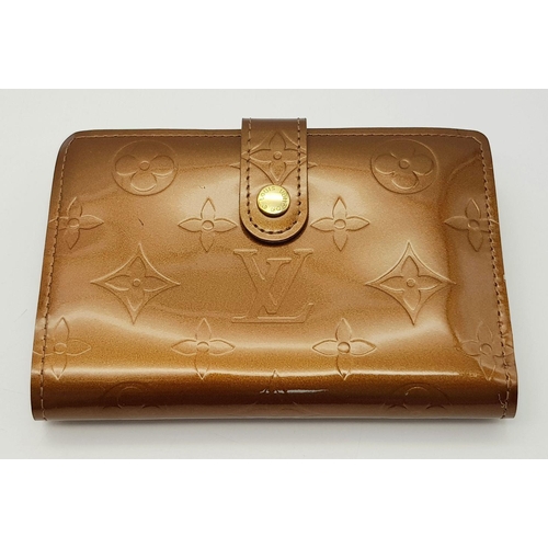 709 - A Louis Vuitton Patent Bronze Leather Purse. Monogram decoration. Brown leather interior. 13cm x 9cm... 