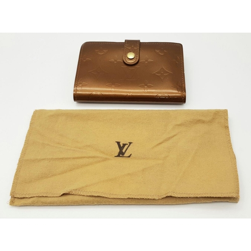 709 - A Louis Vuitton Patent Bronze Leather Purse. Monogram decoration. Brown leather interior. 13cm x 9cm... 