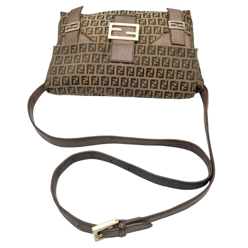 710 - A Fendi Zucca Brown Canvas Tote Bag. Zucca canvas exterior with brown leather trims and silver-toned... 