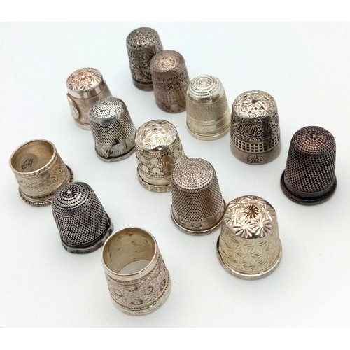 906 - A Collection of 13 Thimbles. 12 sterling silver and 1 white metal.