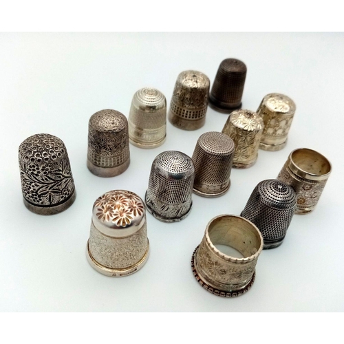 906 - A Collection of 13 Thimbles. 12 sterling silver and 1 white metal.