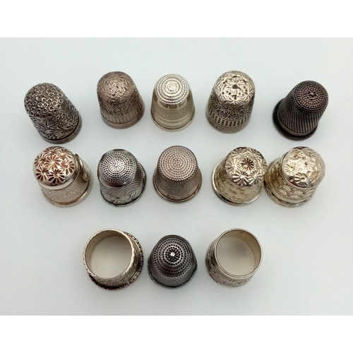 906 - A Collection of 13 Thimbles. 12 sterling silver and 1 white metal.