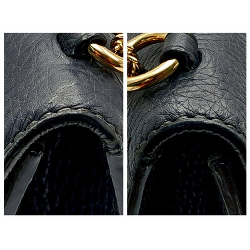 94 - A Valentino Dark Blue Leather Crossbody Bag. Textured exterior with Pyramid stud decoration and gold... 