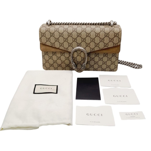 99 - A Gucci Dionysus Shoulder Bag. Monogram textile exterior with silver tone hardware. Open and zipped ... 