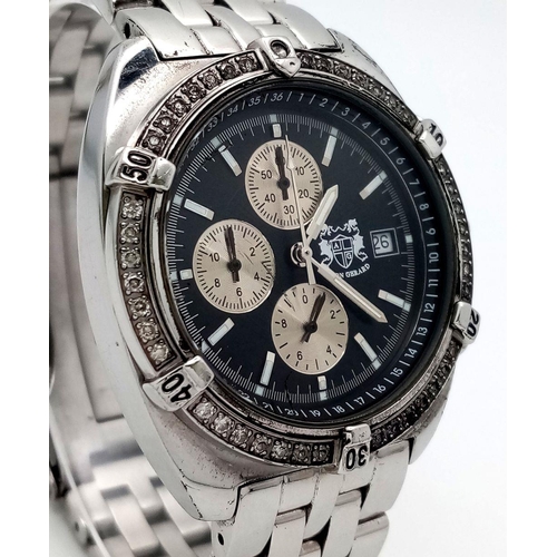 1446 - An Aston Gerrard Quartz Chronograph Watch. Stainless steel bracelet and case - 38mm. Black dial with... 