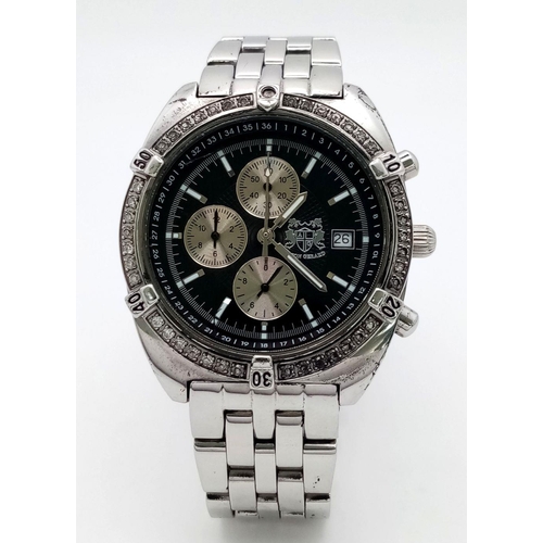 1446 - An Aston Gerrard Quartz Chronograph Watch. Stainless steel bracelet and case - 38mm. Black dial with... 