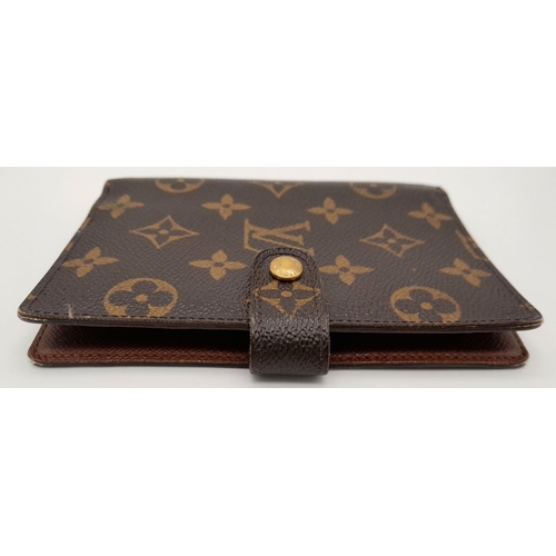 1383 - A Louis Vuitton Agenda/Planner Cover. Monogram coated canvas exterior with gold-toned hardware and p... 