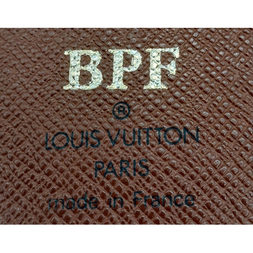 1383 - A Louis Vuitton Agenda/Planner Cover. Monogram coated canvas exterior with gold-toned hardware and p... 