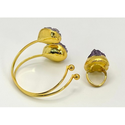 1373 - A very unusual, lavishly gold-plated bangle and matching ring with large, natural, Amethyst crystal ... 