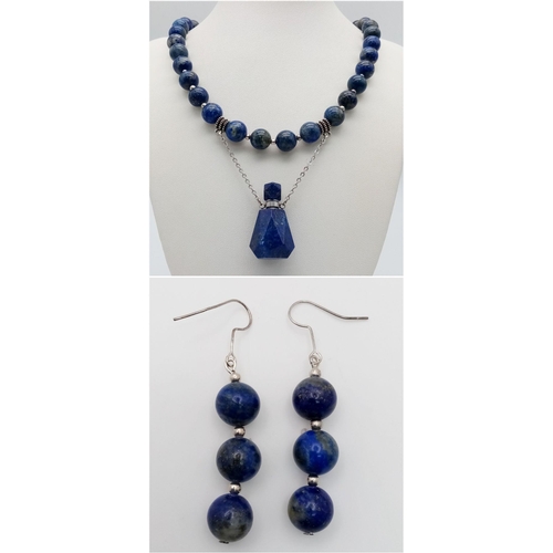 1394 - A fabulous lapis lazuli necklace with a rare perfume bottle pendant and assorted earrings in a prese... 