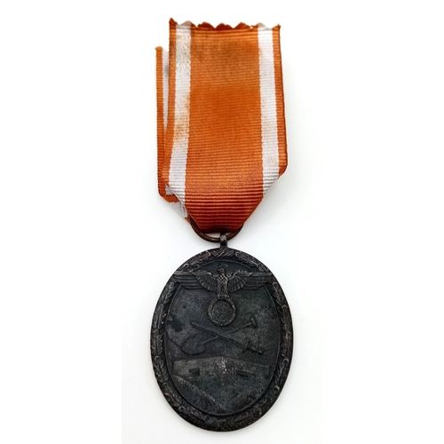 664 - A WW2 German West Wall Medal. Awarded to those who had built or served on the Siegfried Line.