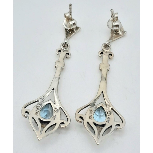 1462 - A Superb Celtic Design, Sterling Silver, Blue Topaz Necklace and Matching Earrings Set by the Renown... 