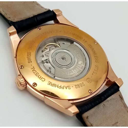 1494 - A Men’s Hamilton Gold Tone Automatic, Skeleton Back, Date Watch. Model H386450-42mm Case. Working Or... 