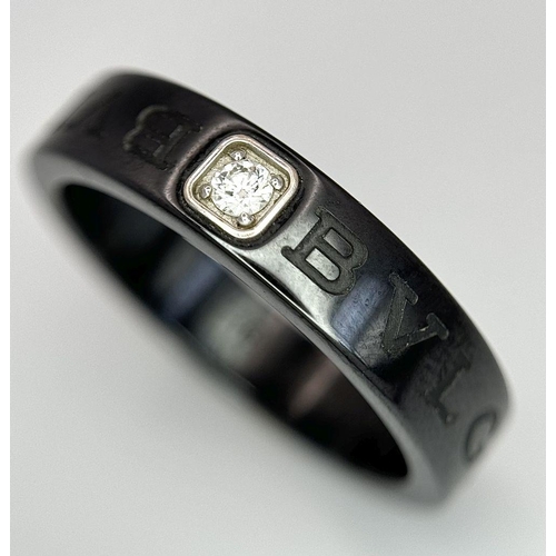 778 - A Designer Bulgari, Black Ceramic and Diamond Ring. Size S.
018940.