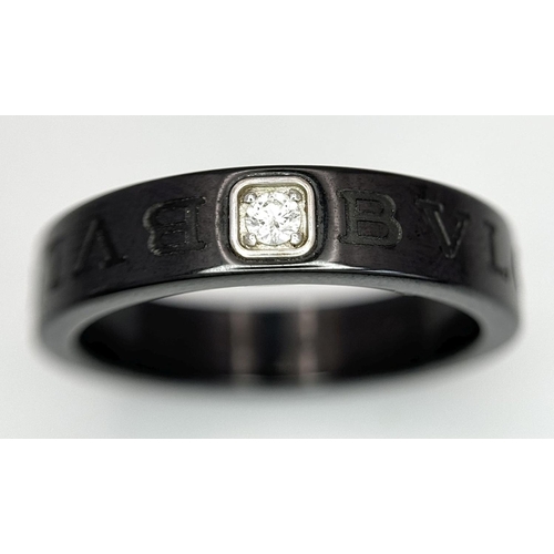 778 - A Designer Bulgari, Black Ceramic and Diamond Ring. Size S.
018940.