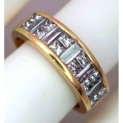 680 - A Stylish 18K Yellow Gold Diamond Ring. Alternating Princess and Baguette cut Diamonds. 1ctw. Size L... 