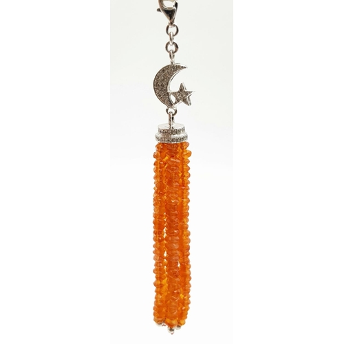 820 - An 18K White Gold and Diamond Moon and Star Pendant with Seven Citrine Small Rondelle Tassels - repr... 