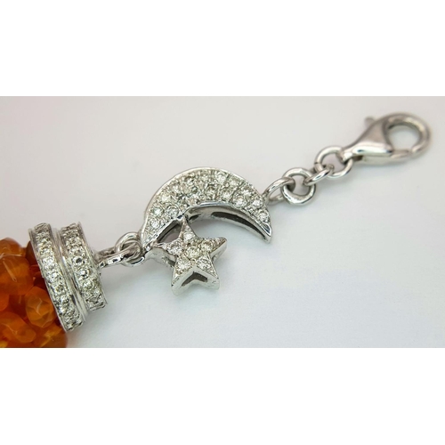 820 - An 18K White Gold and Diamond Moon and Star Pendant with Seven Citrine Small Rondelle Tassels - repr... 