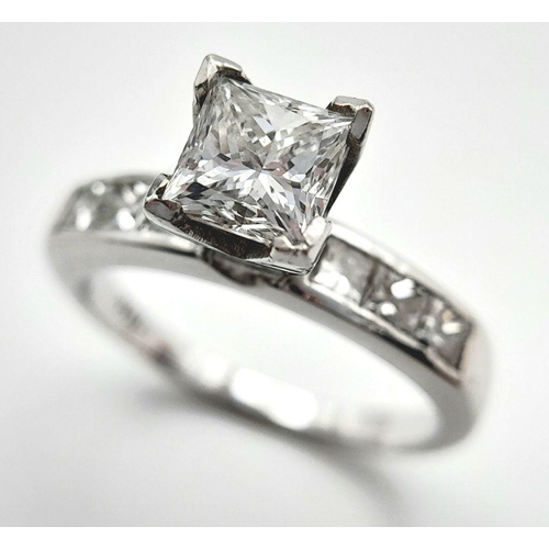 666 - An 18K White Gold and Diamond Bridal Ring Set. A Princess cut 0.55ct, near white (centre stone) diam... 