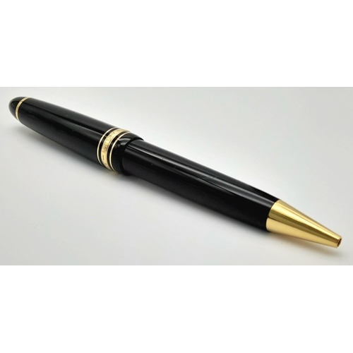 904 - A Classic Montblanc Ballpoint Pen. Black lacquer and gilded decoration. Writes well. 15cm. ref: 0169... 