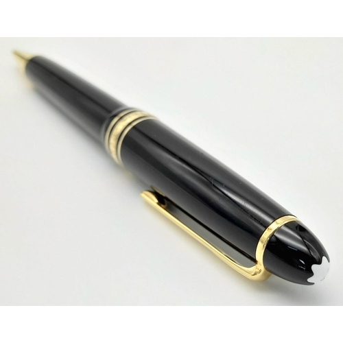 904 - A Classic Montblanc Ballpoint Pen. Black lacquer and gilded decoration. Writes well. 15cm. ref: 0169... 