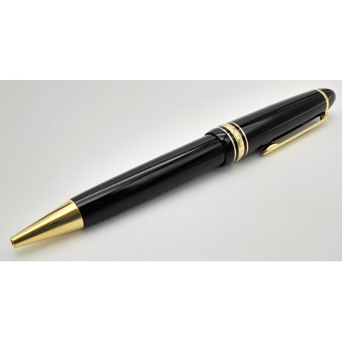 904 - A Classic Montblanc Ballpoint Pen. Black lacquer and gilded decoration. Writes well. 15cm. ref: 0169... 