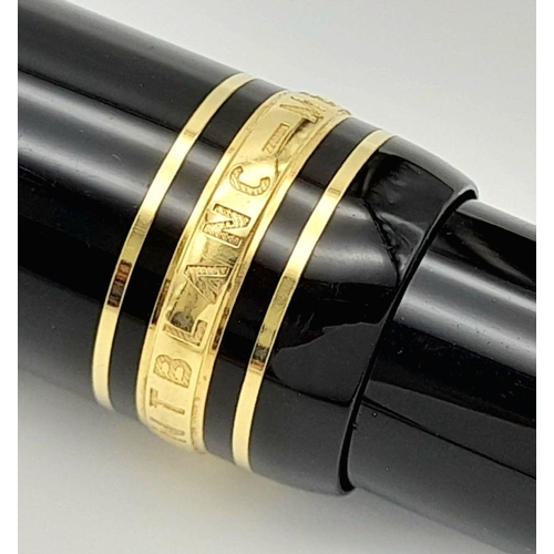 904 - A Classic Montblanc Ballpoint Pen. Black lacquer and gilded decoration. Writes well. 15cm. ref: 0169... 