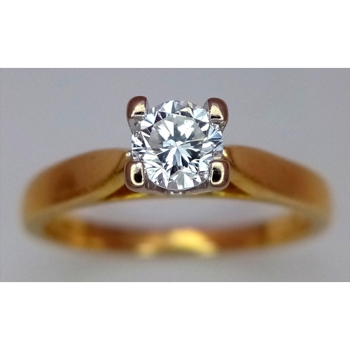 897 - An 18K Yellow Gold Diamond Solitaire Ring. 0.40ct brilliant round cut diamond. Size L. 3.34g total w... 