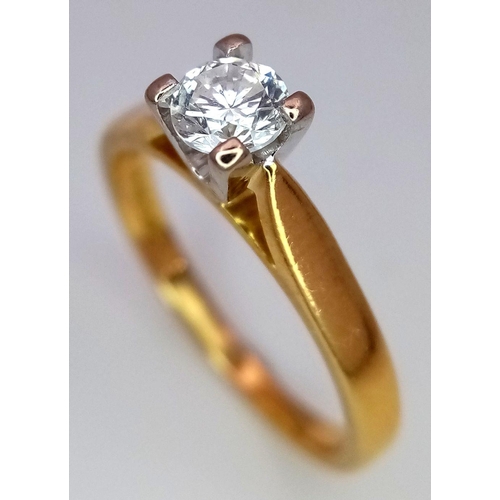 897 - An 18K Yellow Gold Diamond Solitaire Ring. 0.40ct brilliant round cut diamond. Size L. 3.34g total w... 