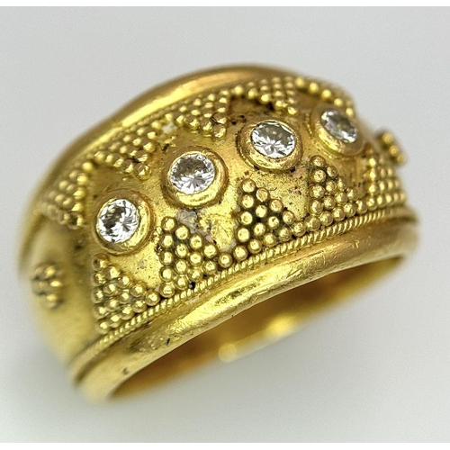 638 - A 22K Yellow Gold Four Stone Diamond Ring. Etruscan style wide band ring with beaded geometric decor... 