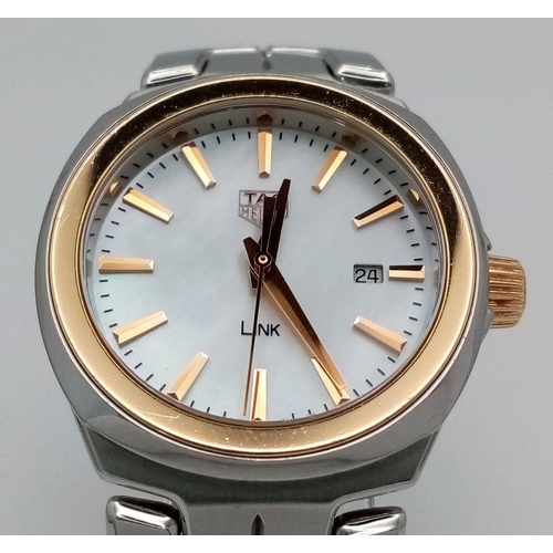 862 - A Tag Heuer Link Quartz Ladies Watch. Stainless steel bracelet and case - 32mm. Mother of pearl dial... 