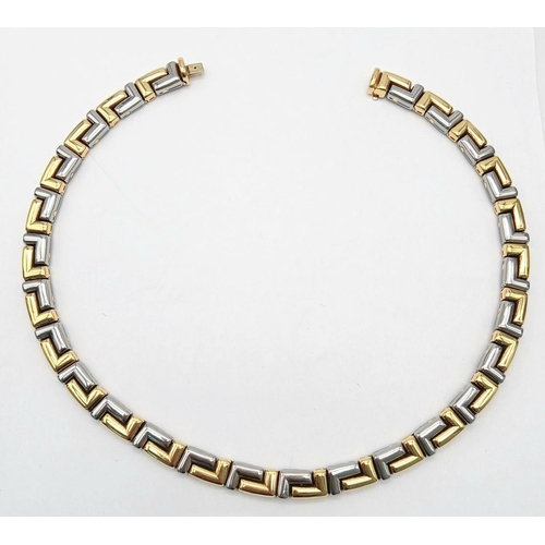 561 - A Gorgeous Bvlgari Collar Necklace in 18K Gold and Steel. Geometric design. Hinged clip mechanism. I... 