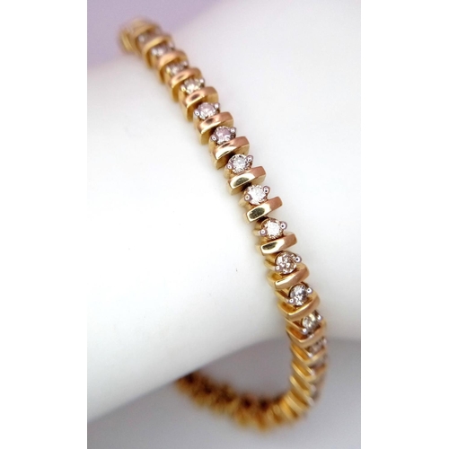 1127 - A 9K YELLOW GOLD DIAMOND TENNIS BRACELET. 2CTW. 14.7G. 19CM. SC3065