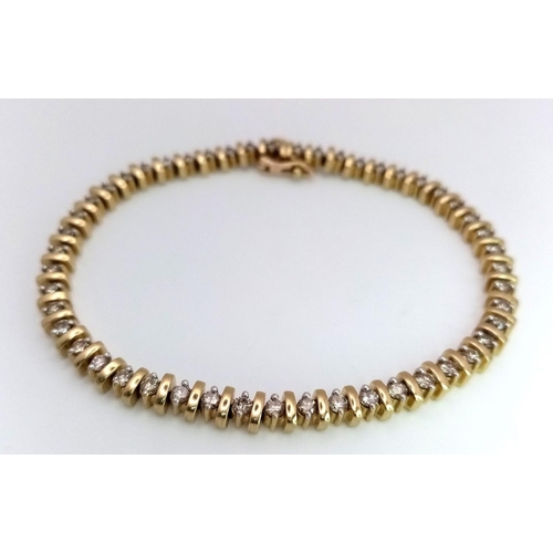 1127 - A 9K YELLOW GOLD DIAMOND TENNIS BRACELET. 2CTW. 14.7G. 19CM. SC3065