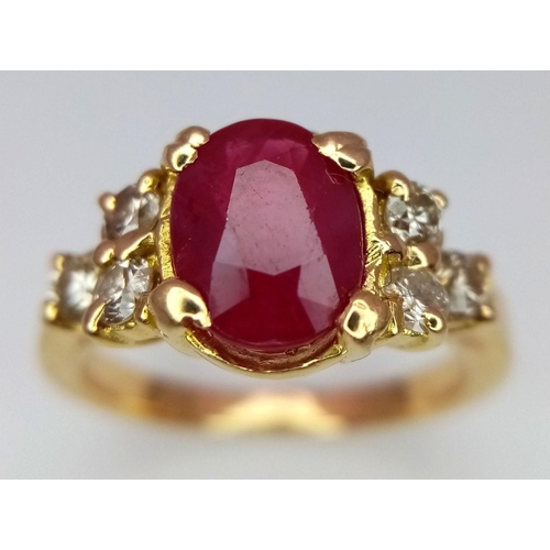 1253 - AN 18K YELLOW GOLD ( TESTED ) DIAMOND & RUBY RING - 1.50CT OVAL RUBY. 5.1G. SIZE M. JR 18