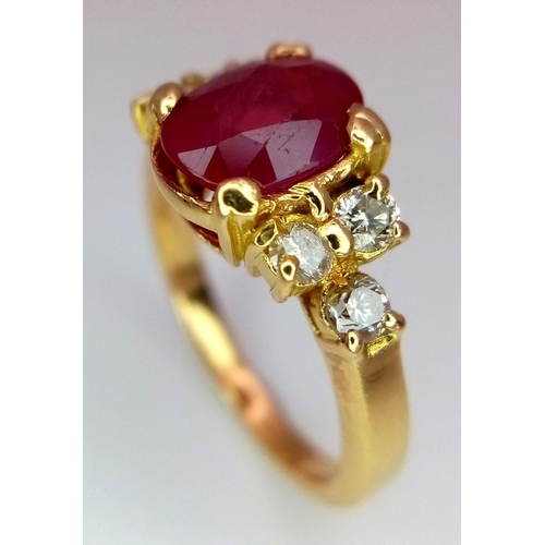 1253 - AN 18K YELLOW GOLD ( TESTED ) DIAMOND & RUBY RING - 1.50CT OVAL RUBY. 5.1G. SIZE M. JR 18