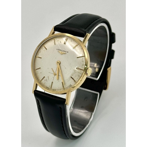 1185 - A Vintage 9K Gold Cased Longine Gents Watch. New black leather strap. 9k gold case - 32mm. Recently ... 