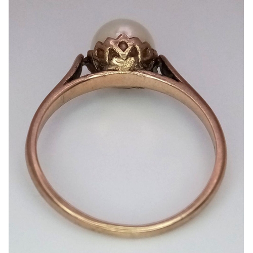 1407 - A Vintage 9K Yellow Gold Pearl Solitaire Ring. Size L/M. 2g total weight.