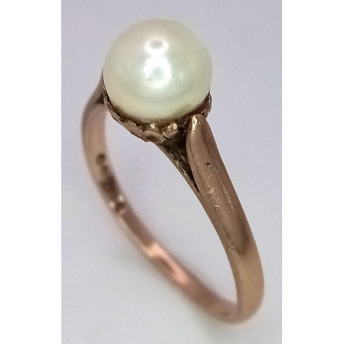 1407 - A Vintage 9K Yellow Gold Pearl Solitaire Ring. Size L/M. 2g total weight.