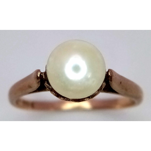 1407 - A Vintage 9K Yellow Gold Pearl Solitaire Ring. Size L/M. 2g total weight.