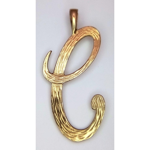 1386 - A Fancy C, Possibly E 9K Gold Pendant. 4cm. 1.8g weight.