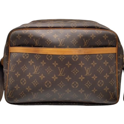 799 - A Louis Vuitton monogram reporter GM shoulder bag, with both padlock and keys present and an adjusta... 