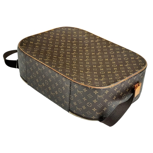 1009 - A Louis Vuitton Packall Travel Bag. Monogram coated canvas exterior with leather trim, single handle... 