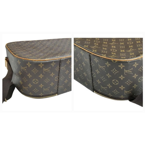 1009 - A Louis Vuitton Packall Travel Bag. Monogram coated canvas exterior with leather trim, single handle... 