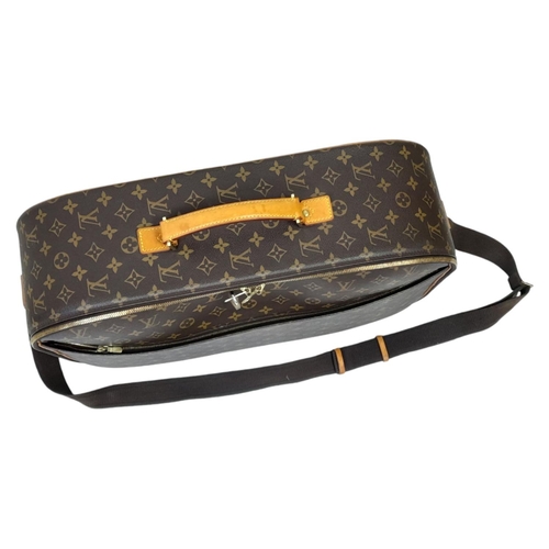 1009 - A Louis Vuitton Packall Travel Bag. Monogram coated canvas exterior with leather trim, single handle... 