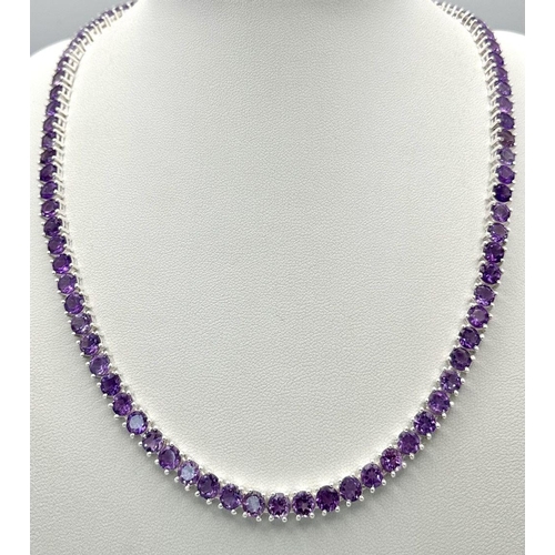 1163 - An Amethyst Gemstone Tennis Necklace set in 925 Silver. 45cm. CD-1488.