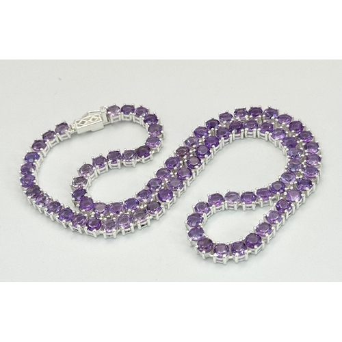 1163 - An Amethyst Gemstone Tennis Necklace set in 925 Silver. 45cm. CD-1488.