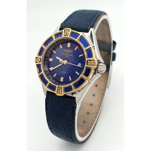 1234 - A Breitling J Class Quartz Ladies Watch. Blue leather strap. Case - 30mm. Blue dial with date window... 