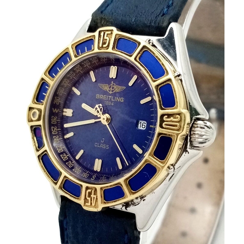 1234 - A Breitling J Class Quartz Ladies Watch. Blue leather strap. Case - 30mm. Blue dial with date window... 